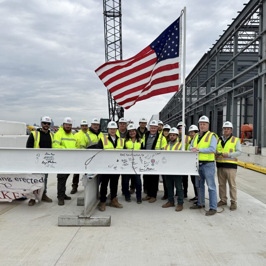 team of builders with yellow safety vests